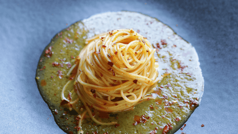 Chitarra di Campofilone al limone con datterini gialli, 'nduja e polvere di peperone dolce